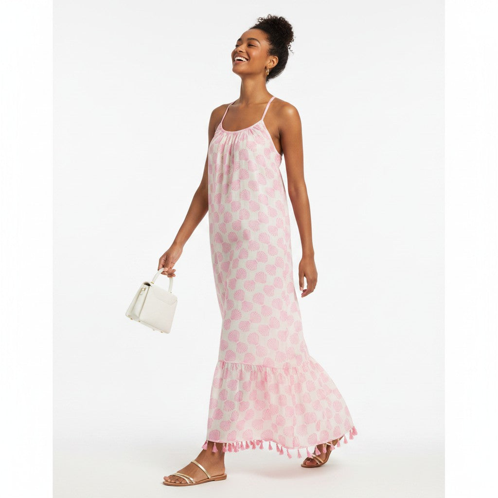 Mer St. Barth Chantal sundress in shell beach pink with a relaxed fit, spaghetti straps, and a tasseled hem.