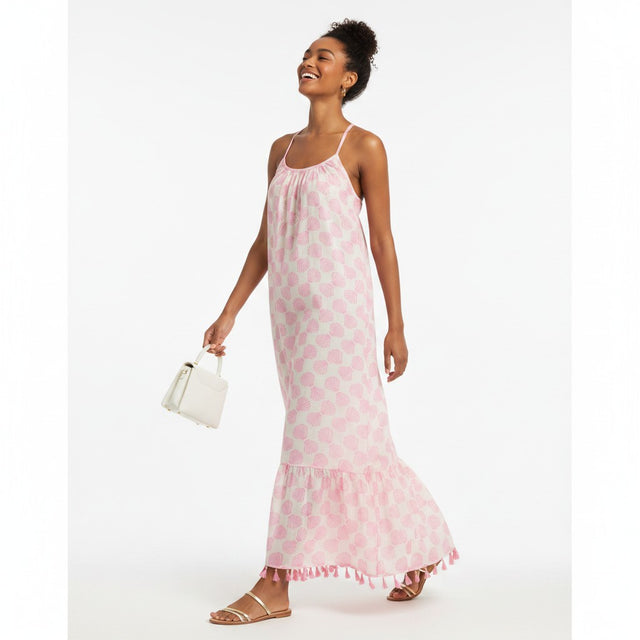 Mer St. Barth Chantal sundress in shell beach pink with a relaxed fit, spaghetti straps, and a tasseled hem.