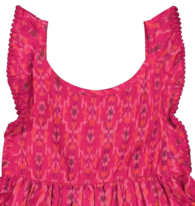 Mer St. Barth girls flutter sleeve dress in pink rosette ikat print with pom-pom trim detail
