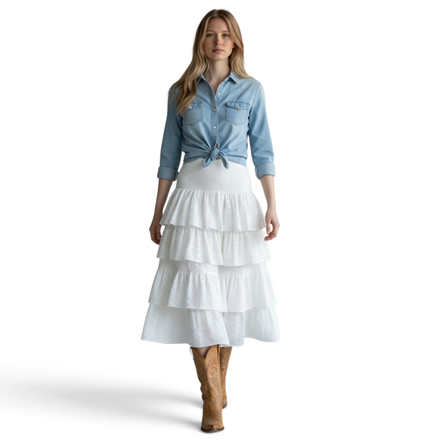 Mer St. Barth Karmin women's white eyelet ruffle midi skirt paired with a denim shirt and brown cowboy boots