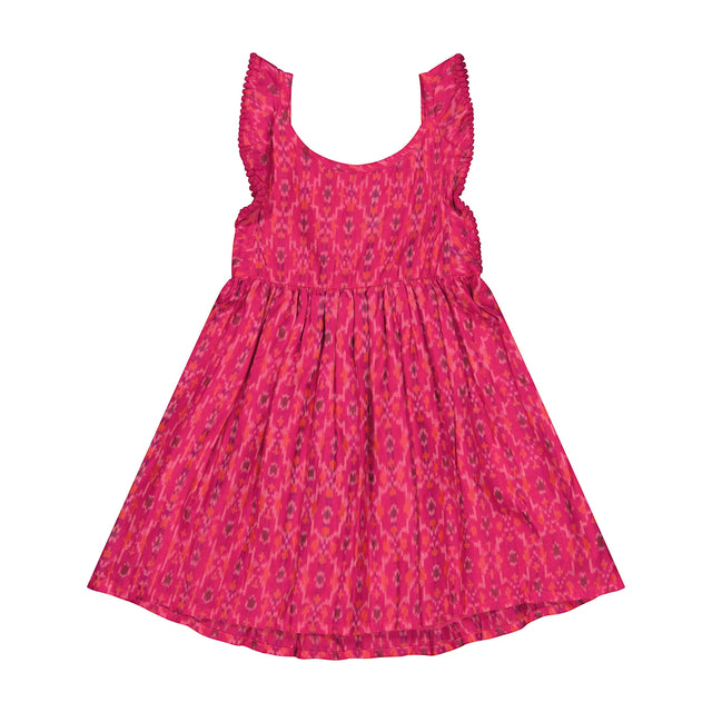 Mer St. Barth Daphne girls flutter sleeve dress in a vibrant pink rosette ikat print with a relaxed, breezy fit.
