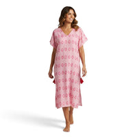 Mer St. Barth Capucine women's pink maxi caftan featuring rose embroidery, V-neck, and side tassel details.