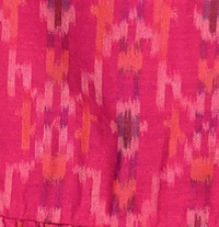 Mer St. Barth Daphne flutter sleeve dress in a vibrant pink and orange rosette ikat print fabric