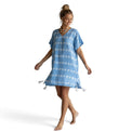 Mer St. Barth Capucine mini caftan in sky blue with white embroidery, featuring short sleeves and tassel side vents.