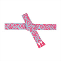 Mer St. Barth sky blue fabric belt with bright pink floral embroidery and tassel ends for the Sandrine maxi dress.