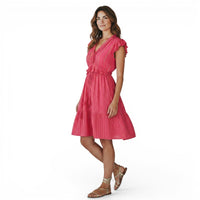 Mer St. Barth Coralie fuchsia lurex mini dress with ruffled neckline and sleeves, cinched waist, and tassel details.